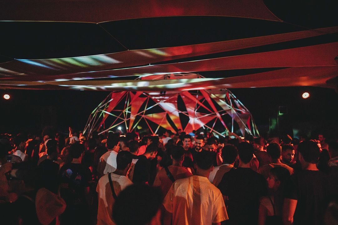 Chapter V of Wabi, the faceted dome lit at night